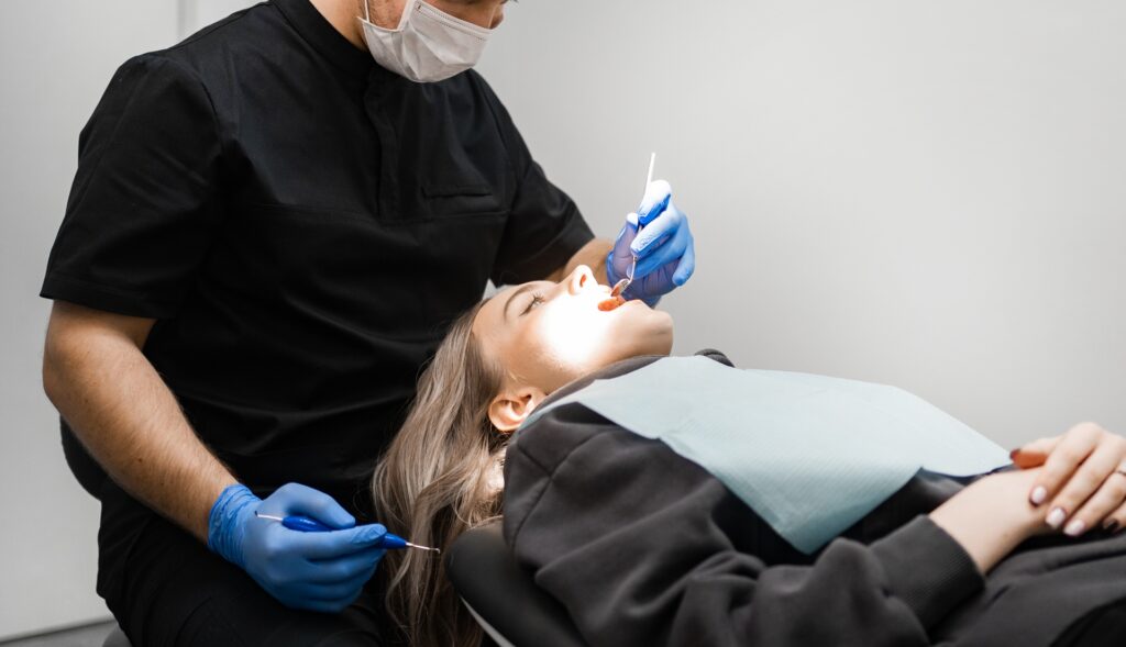 female patient undergoing dental treatment