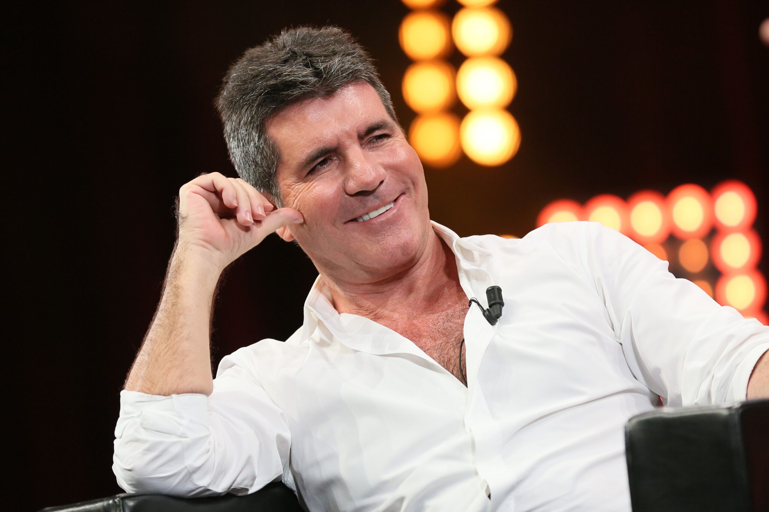 Simon Cowell smile and teeth