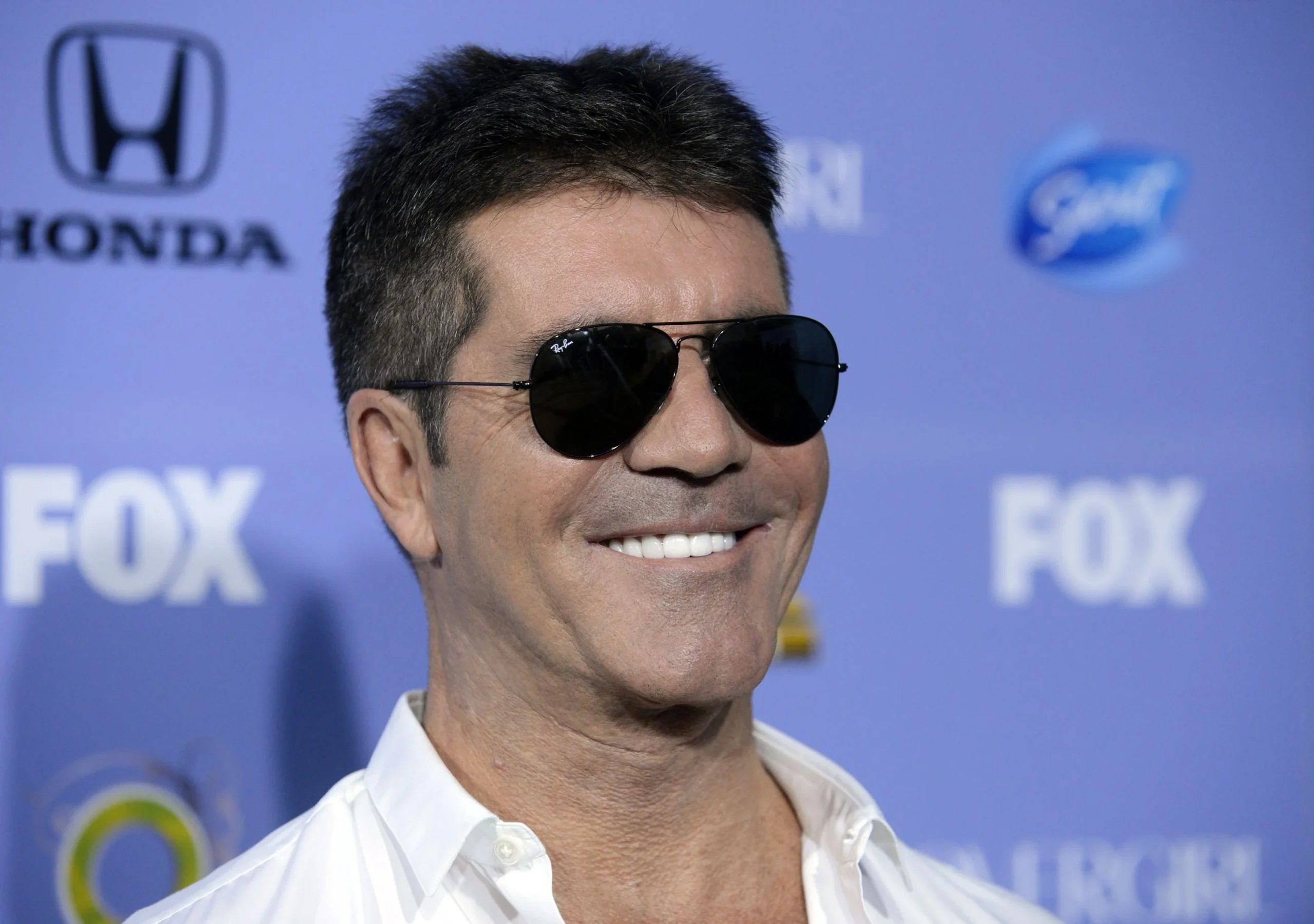 Simon Cowell smile